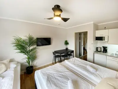 Ein Bett oder Betten in einem Zimmer der Unterkunft Cozy apartment in city center