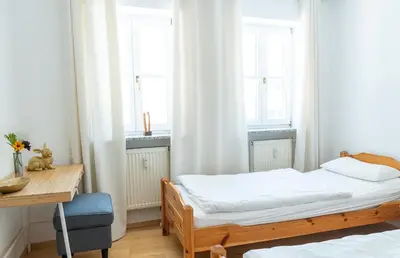 Ein Bett oder Betten in einem Zimmer der Unterkunft Ferienwohnungen hinter der Residenz
