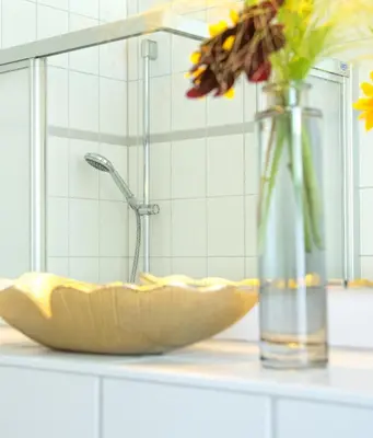 Ein Badezimmer in der Unterkunft Ferienwohnungen hinter der Residenz