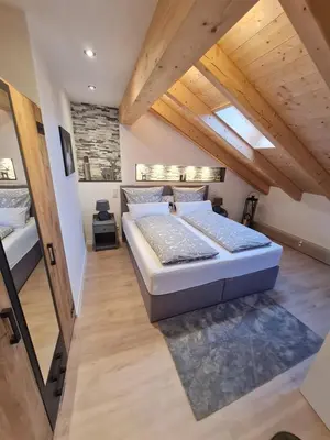 Ein Bett oder Betten in einem Zimmer der Unterkunft Bergkristall