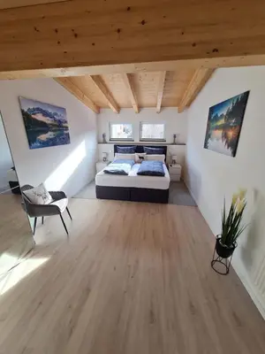 Ein Bett oder Betten in einem Zimmer der Unterkunft Bergkristall