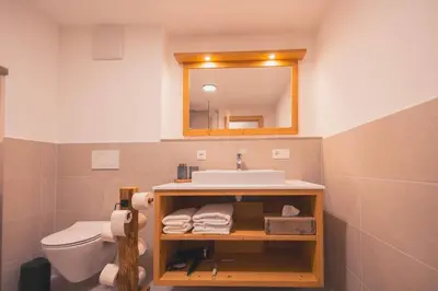 Ein Badezimmer in der Unterkunft zumHofer