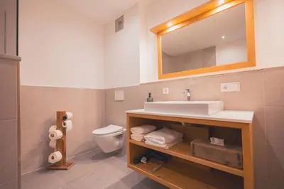 Ein Badezimmer in der Unterkunft zumHofer
