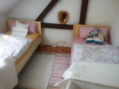 Ein Bett oder Betten in einem Zimmer der Unterkunft Ferienwohnung am Walnussbaum