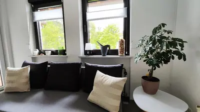 Ein Sitzbereich in der Unterkunft Stilvolle zwei Etagenwohnung, Parkplatz