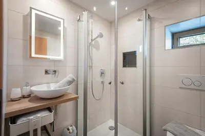 Ein Badezimmer in der Unterkunft Grabner Riedleiten Berghütte Wildbarren