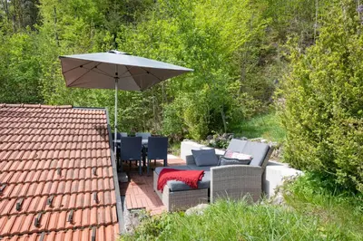 Ein Garten an der Unterkunft Grabner Riedleiten Berghütte Wildbarren