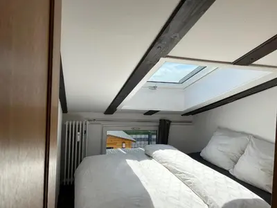 Ein Bett oder Betten in einem Zimmer der Unterkunft Ferienhaus Andrea mit Whirlpool und Sauna