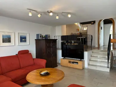 Ein Sitzbereich in der Unterkunft Ferienhaus Andrea mit Whirlpool und Sauna