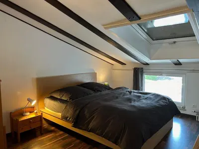 Ein Bett oder Betten in einem Zimmer der Unterkunft Ferienhaus Andrea mit Whirlpool und Sauna