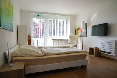 Ein Bett oder Betten in einem Zimmer der Unterkunft Seefelder Berge und Seen Appartements