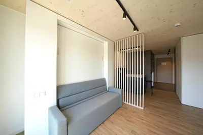 Ein Sitzbereich in der Unterkunft Timber One Boardinghouse Dorfen