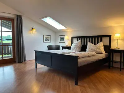 Ein Bett oder Betten in einem Zimmer der Unterkunft Ferienhaus Woulli