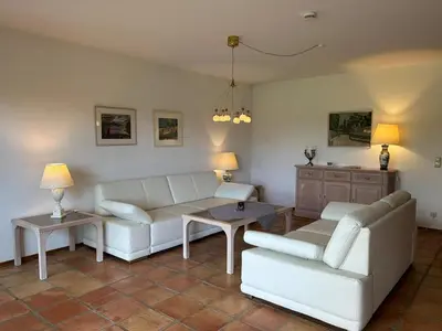 Ein Sitzbereich in der Unterkunft Ferienhaus Woulli