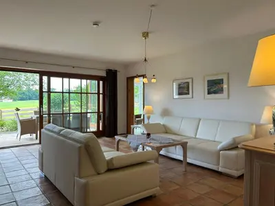Ein Sitzbereich in der Unterkunft Ferienhaus Woulli