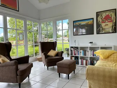Ein Sitzbereich in der Unterkunft Ferienhaus Woulli