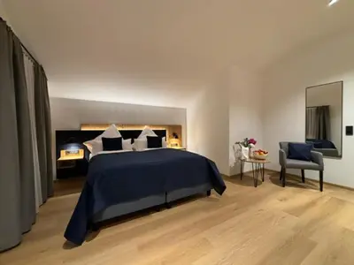 Ein Bett oder Betten in einem Zimmer der Unterkunft Hotel Restaurant Hafenwirt