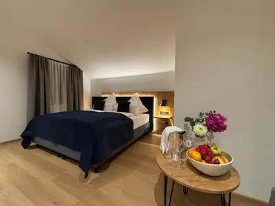 Ein Bett oder Betten in einem Zimmer der Unterkunft Hotel Restaurant Hafenwirt