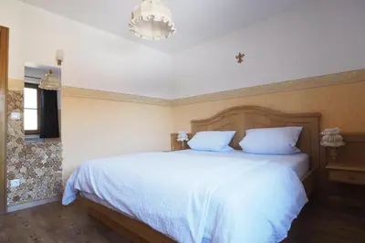 Ein Bett oder Betten in einem Zimmer der Unterkunft Ferienwohnungen Haus-Diane