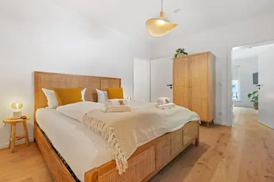 Ein Bett oder Betten in einem Zimmer der Unterkunft ma suite - High-quality new apartment Augsburg