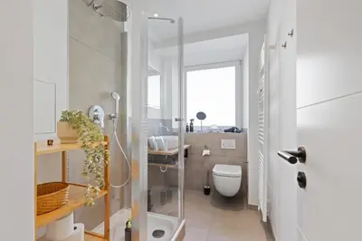 Ein Badezimmer in der Unterkunft ma suite - High-quality new apartment Augsburg