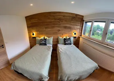 Ein Bett oder Betten in einem Zimmer der Unterkunft Dachterrasse Panorama-Glück II