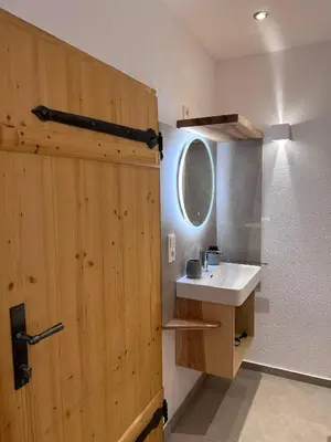 Ein Badezimmer in der Unterkunft Ferienwohnung BERGWELTEN