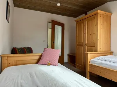 Ein Bett oder Betten in einem Zimmer der Unterkunft Ferienwohnung am Richterbichl