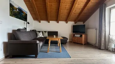 Ein Sitzbereich in der Unterkunft Ferienwohnung Alpina 1