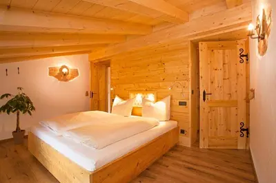 Ein Bett oder Betten in einem Zimmer der Unterkunft Thaurerhof Urlaub auf dem Bauernhof