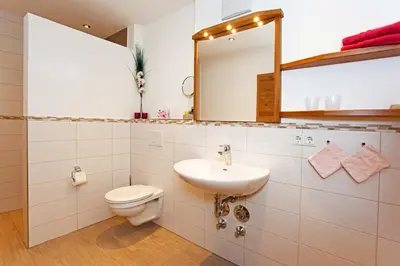 Ein Badezimmer in der Unterkunft Thaurerhof Urlaub auf dem Bauernhof