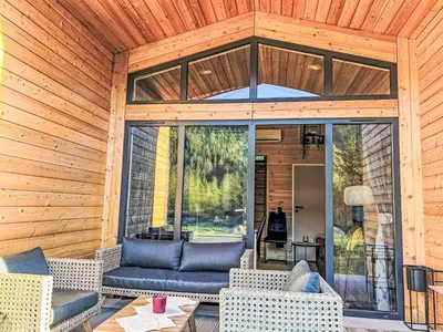 Ein Sitzbereich in der Unterkunft Holiday Home Tiny Haus Glockenalm-Wendelsteinblick by Interhome