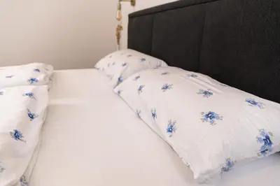 Ein Bett oder Betten in einem Zimmer der Unterkunft Pension Märkl Augsburg