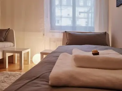 Ein Bett oder Betten in einem Zimmer der Unterkunft Sweet Home, Central & Quiet