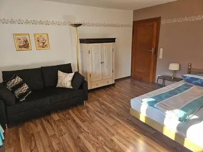 Ein Bett oder Betten in einem Zimmer der Unterkunft Ferienhaus am Tegernsee, Ferienhaus Gottschlicht
