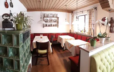Ein Sitzbereich in der Unterkunft Gästehaus Bergfrieden, Ferienwohnung Eva