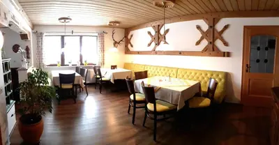 Ein Sitzbereich in der Unterkunft Gästehaus Bergfrieden, Ferienwohnung Andrea