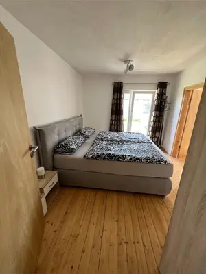 Ein Bett oder Betten in einem Zimmer der Unterkunft Ferienwohnung Mußner im Chiemgau