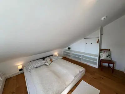 Ein Bett oder Betten in einem Zimmer der Unterkunft Eichenhöfe