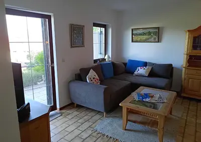 Ein Sitzbereich in der Unterkunft Ferienwohnung EG mit Bergblick