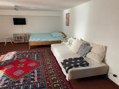 Ein Bett oder Betten in einem Zimmer der Unterkunft AirB33 Apartment Munich privat with little terrace