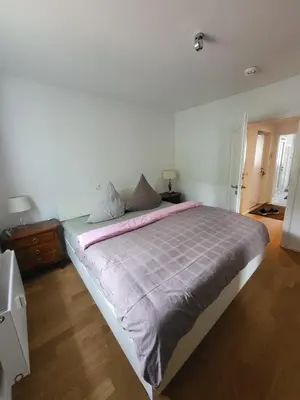 Ein Bett oder Betten in einem Zimmer der Unterkunft NewSuite-Englischen Garten 2 Zimmer Apartment