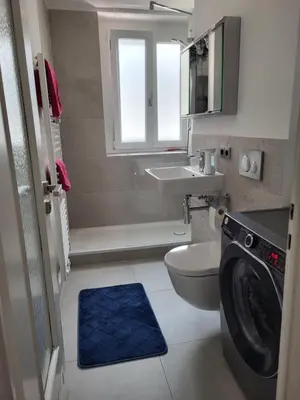 Ein Badezimmer in der Unterkunft NewSuite-Englischen Garten 2 Zimmer Apartment