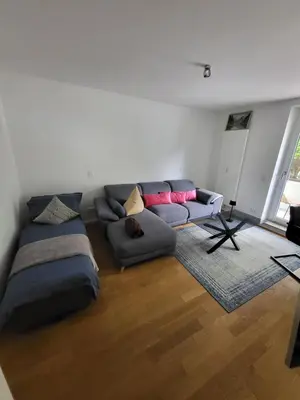 Ein Sitzbereich in der Unterkunft NewSuite-Englischen Garten 2 Zimmer Apartment
