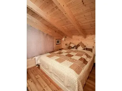 Ein Bett oder Betten in einem Zimmer der Unterkunft Grafenaschau Comfortable holiday residence