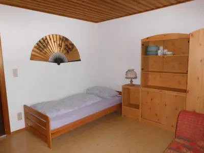 Ein Bett oder Betten in einem Zimmer der Unterkunft Ferienwohnung Schwaiger