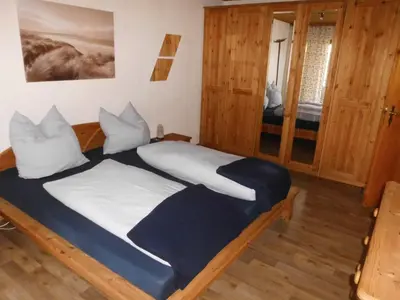 Ein Bett oder Betten in einem Zimmer der Unterkunft Ferienwohnung Schwaiger