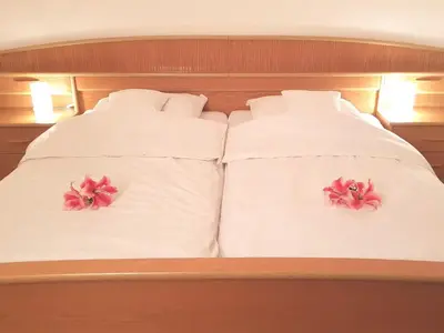 Ein Bett oder Betten in einem Zimmer der Unterkunft Ferienwohnungen Stecher