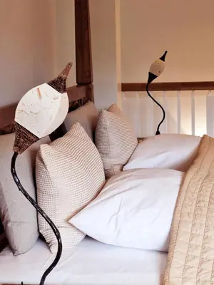 Ein Bett oder Betten in einem Zimmer der Unterkunft Strandhaus Chiemsee