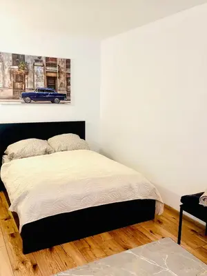 Ein Bett oder Betten in einem Zimmer der Unterkunft City flat 8
